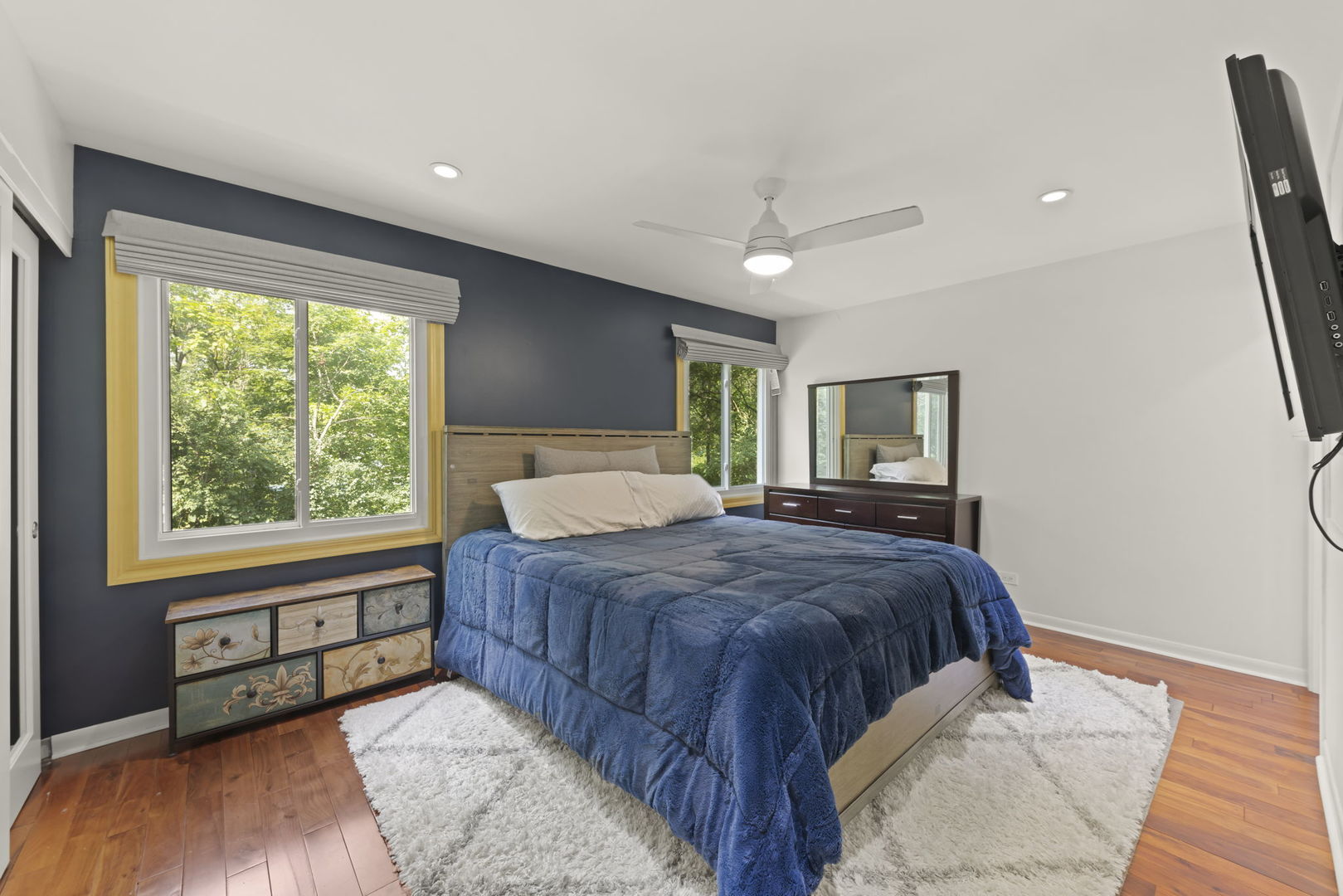 1940 Green Trails Drive Lisle, IL 60532 - Photo 16 of 31 a bedroom with a large bed and a large window