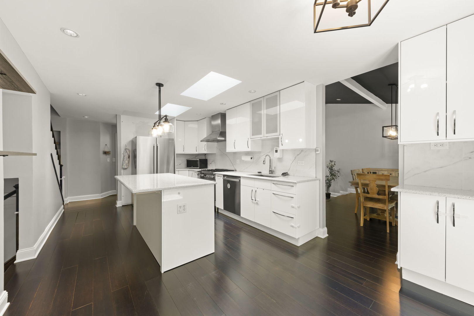 1940 Green Trails Drive Lisle, IL 60532 - Photo 9 of 31 a kitchen with white cabinets and white appliances