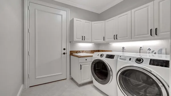 a swimming pool with outdoor seating and yard