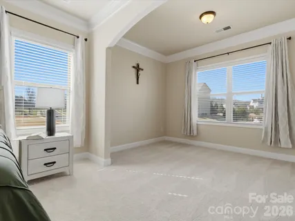 a view of livingroom with furniture and windows