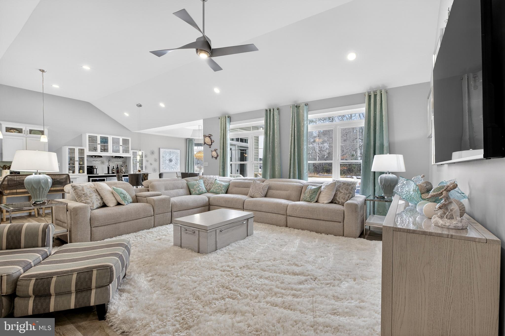 32143 Lynch Road Selbyville, DE 19975 - Photo 16 of 56 a living room with furniture and a large window