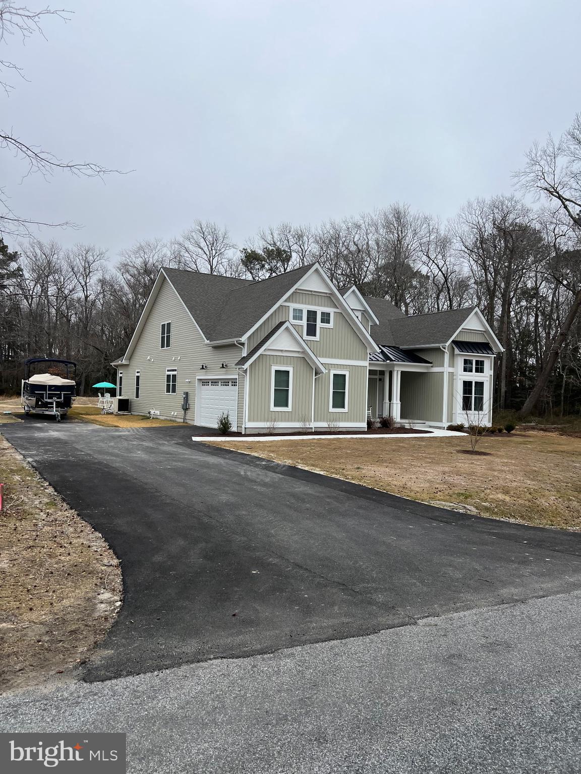 32143 Lynch Road Selbyville, DE 19975 - Photo 3 of 56 a view of houses with city street