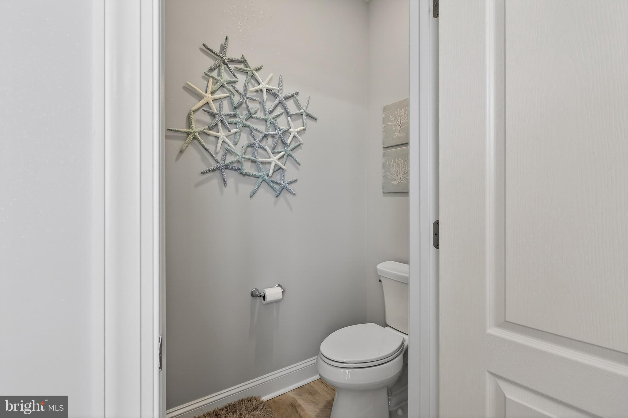 32143 Lynch Road Selbyville, DE 19975 - Photo 31 of 56 a bathroom with a toilet and a shower