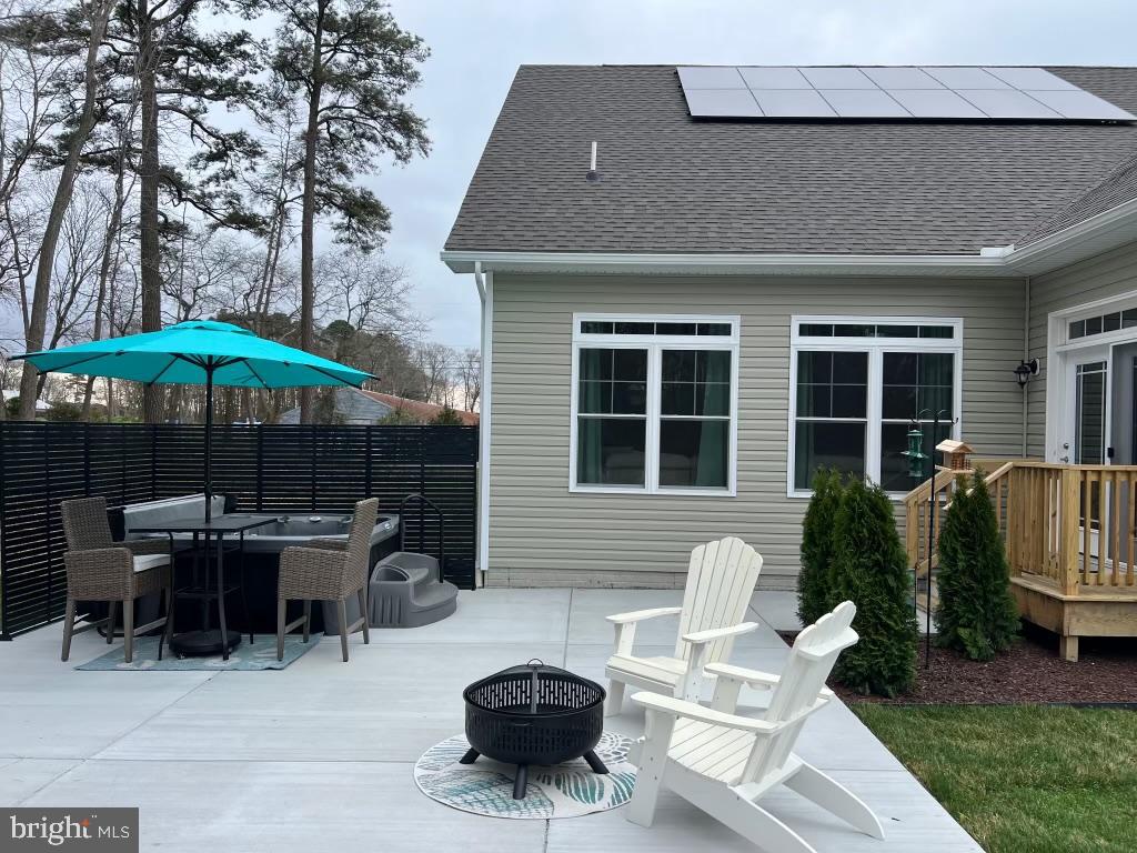 32143 Lynch Road Selbyville, DE 19975 - Photo 52 of 56 a front view of a house with patio