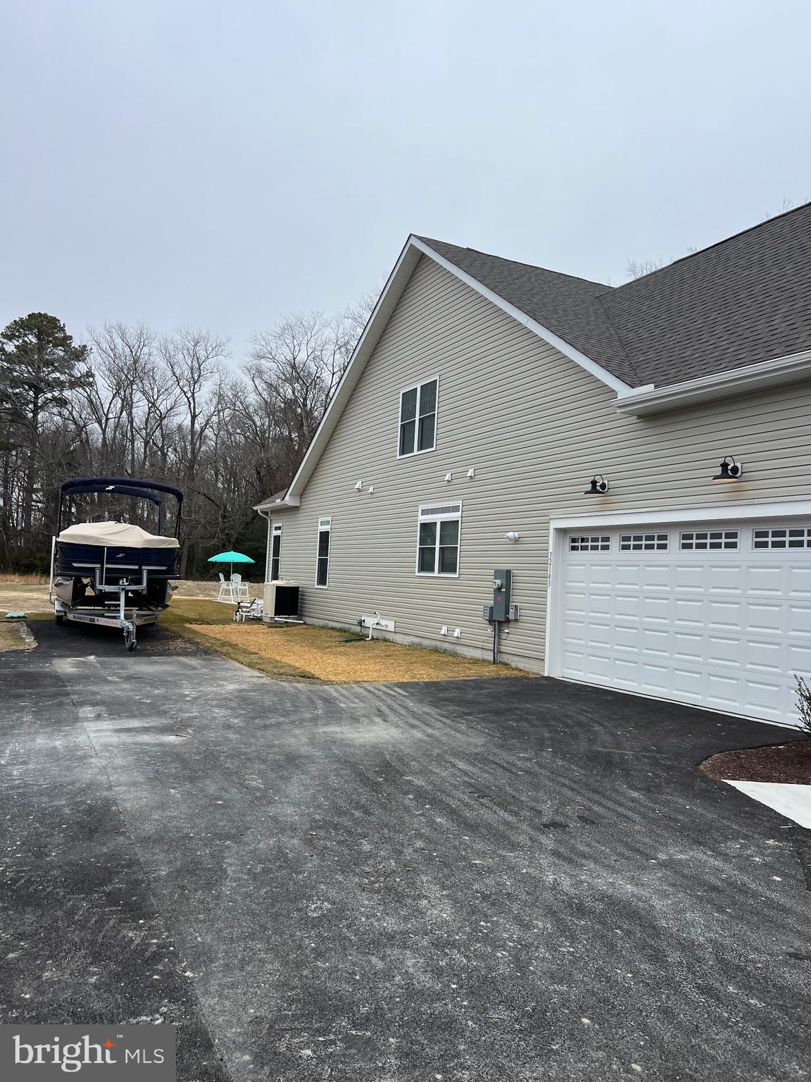 32143 Lynch Road Selbyville, DE 19975 - Photo 55 of 56 a view of a car park in front of house