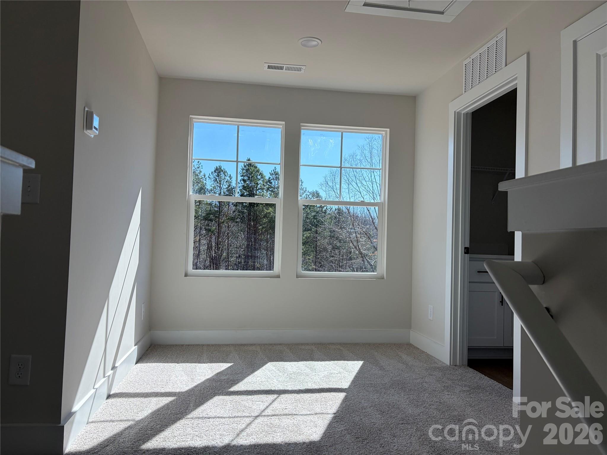 916 Blake Road Albemarle, NC 28001 - Photo 14 of 22 a view of an empty room with a window
