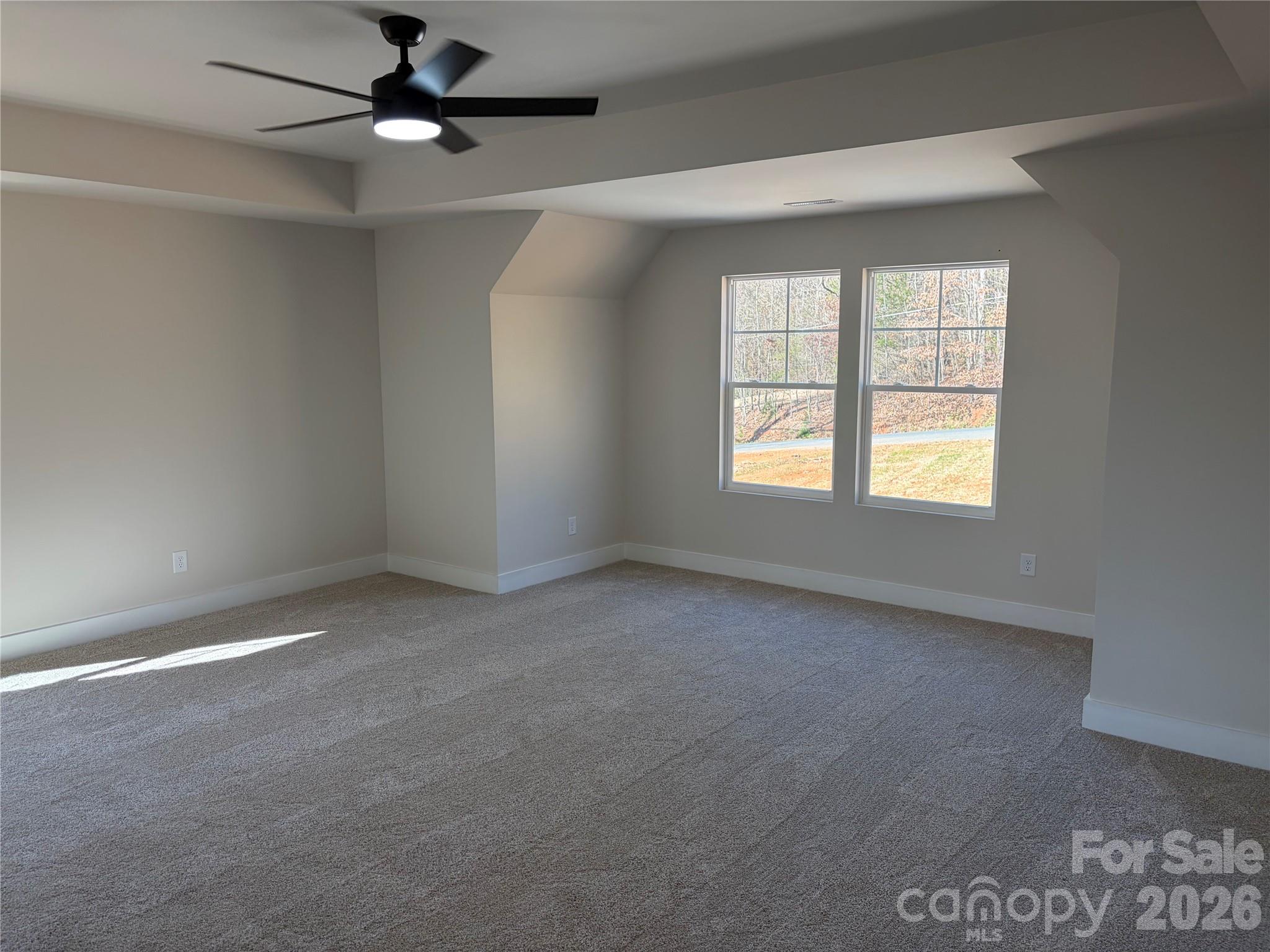 916 Blake Road Albemarle, NC 28001 - Photo 17 of 22 an empty room with a window and a fan