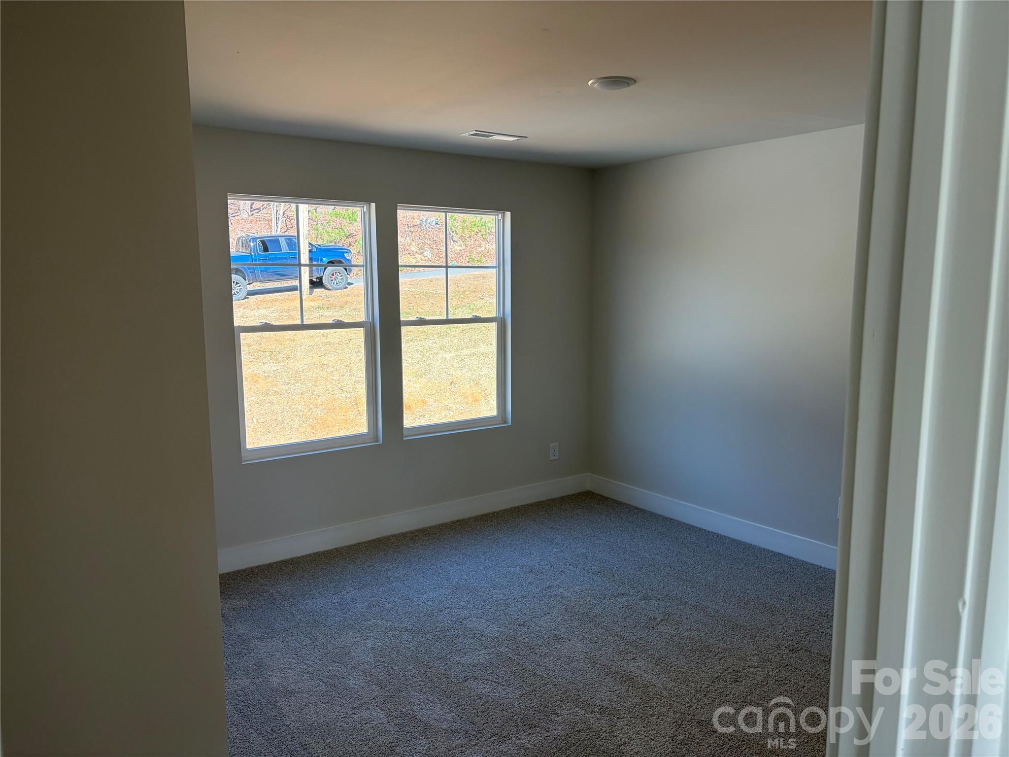 916 Blake Road Albemarle, NC 28001 - Photo 20 of 22 an empty room with a window
