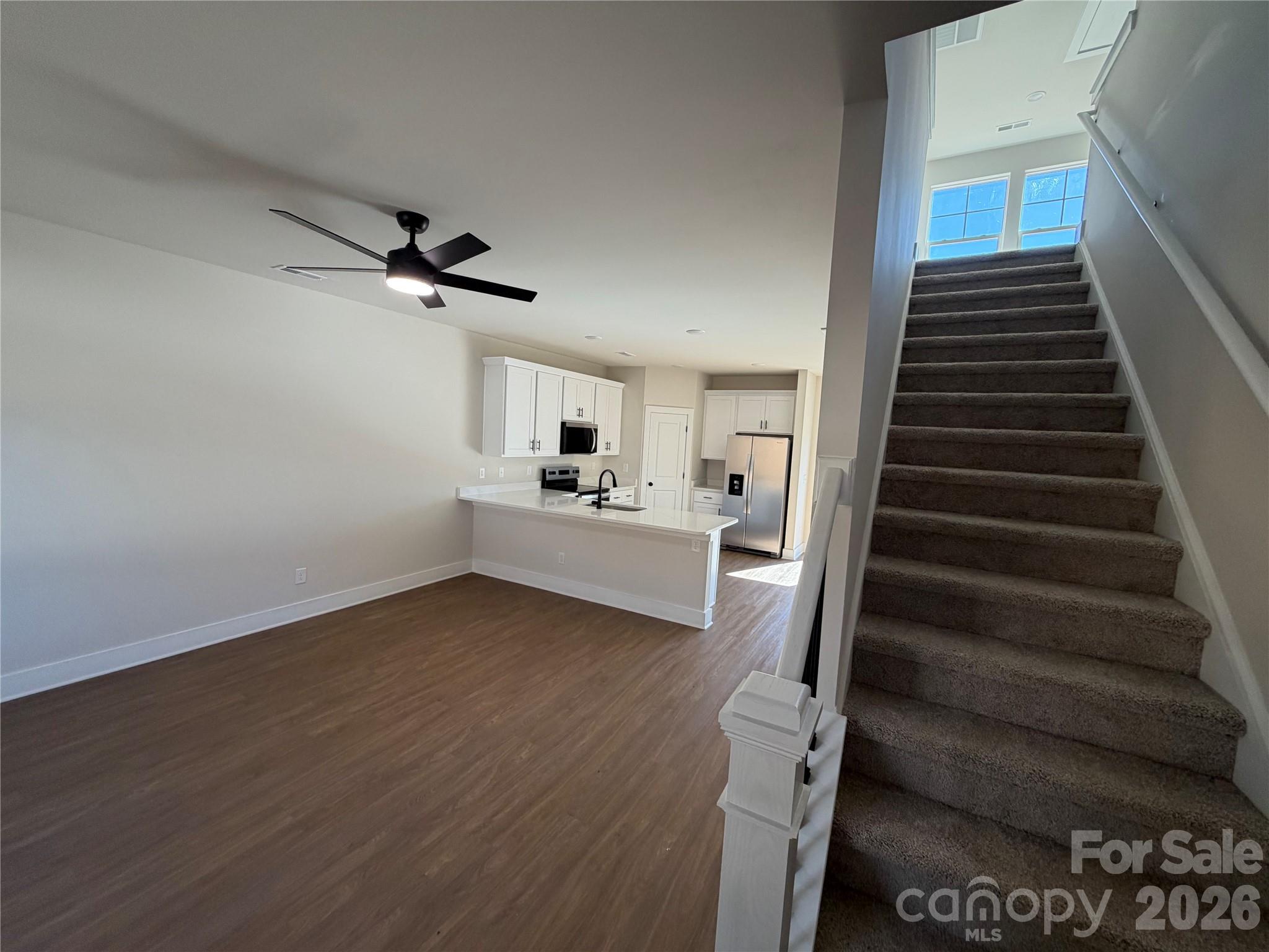 916 Blake Road Albemarle, NC 28001 - Photo 2 of 22 a view of entryway and hall with wooden floor