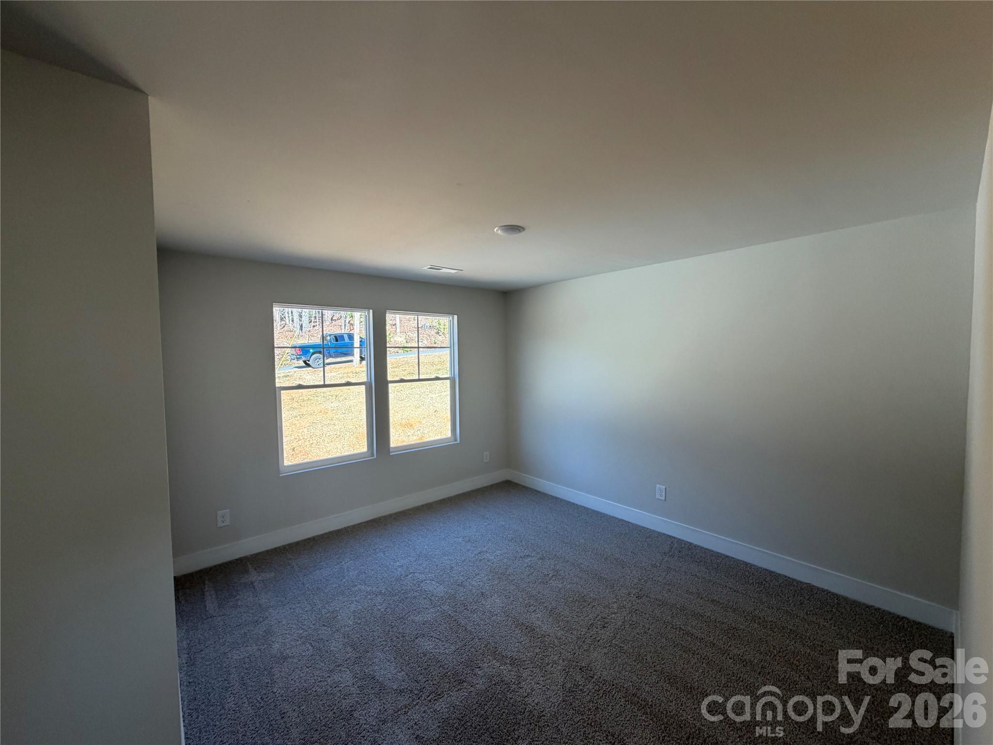 916 Blake Road Albemarle, NC 28001 - Photo 21 of 22 an empty room with a window