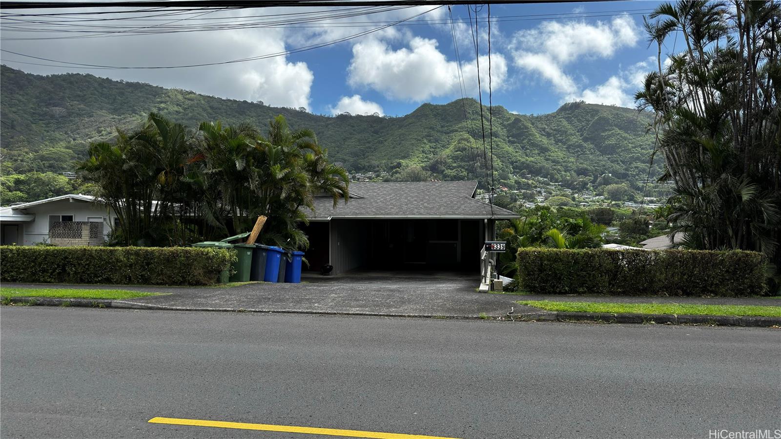 a view of building with mountains in the background