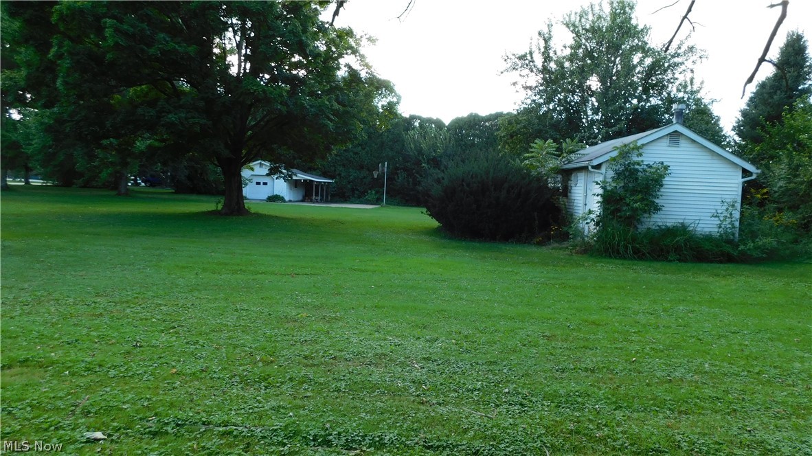 3651 Work Road Ravenna, OH 44266 - Photo 32 of 35 This a a outside view of the shed behind the house and a view of the LARGE lot