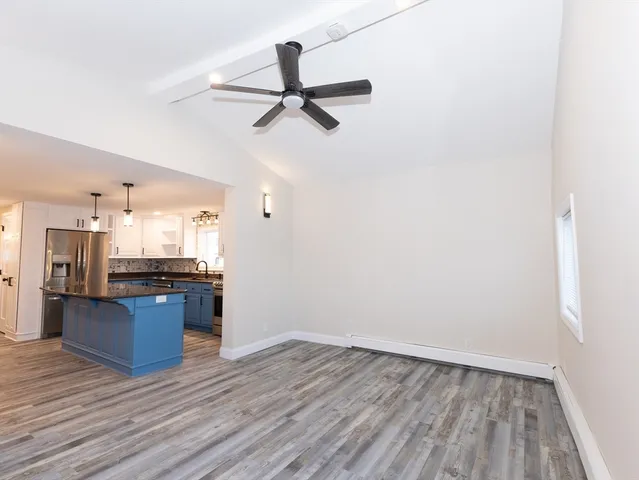 a view of kitchen and wooden floor