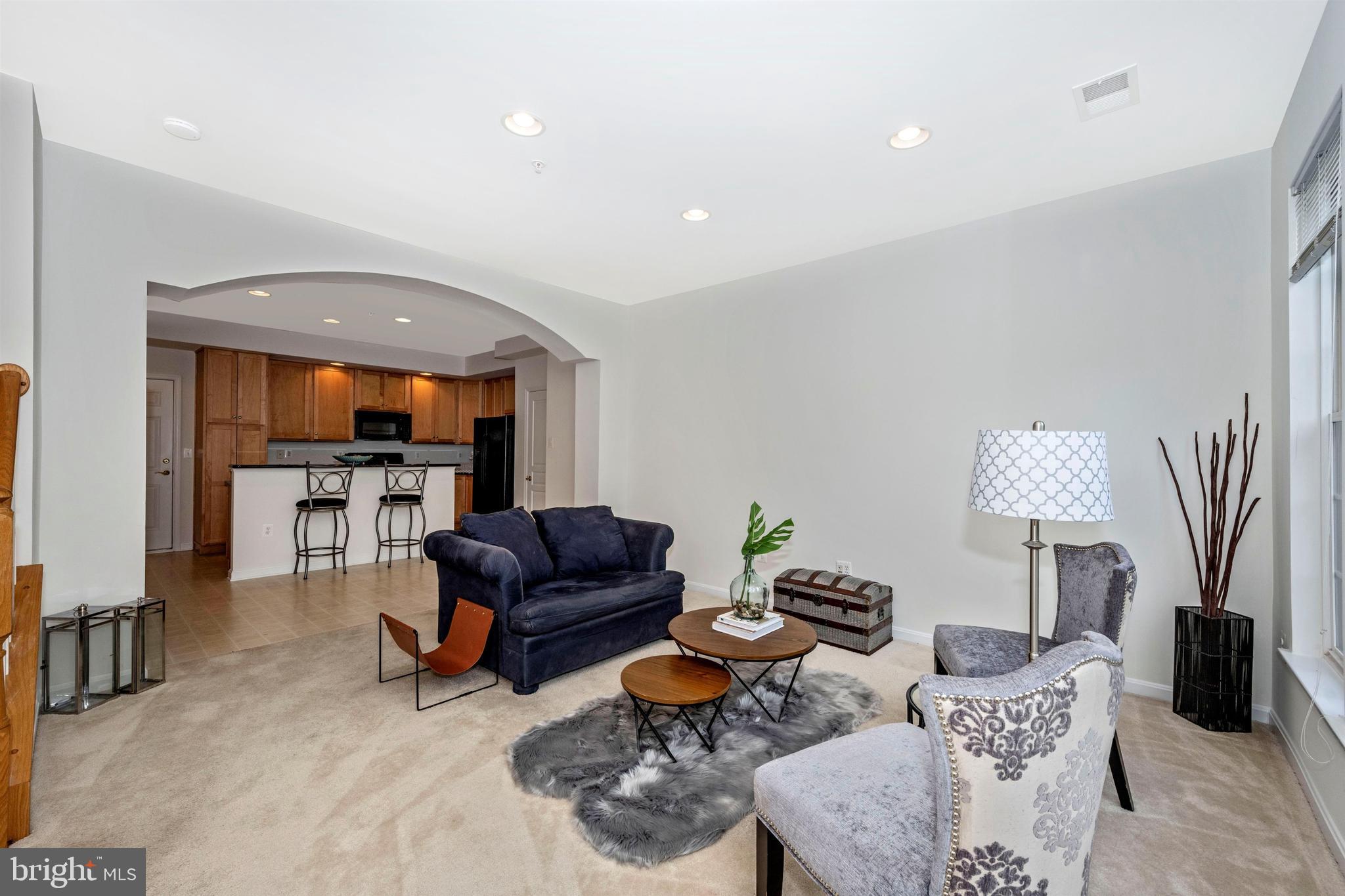 1790 Poolside Way, Unit 22A Frederick, MD 21701 - Photo 9 of 64 carpeted living room