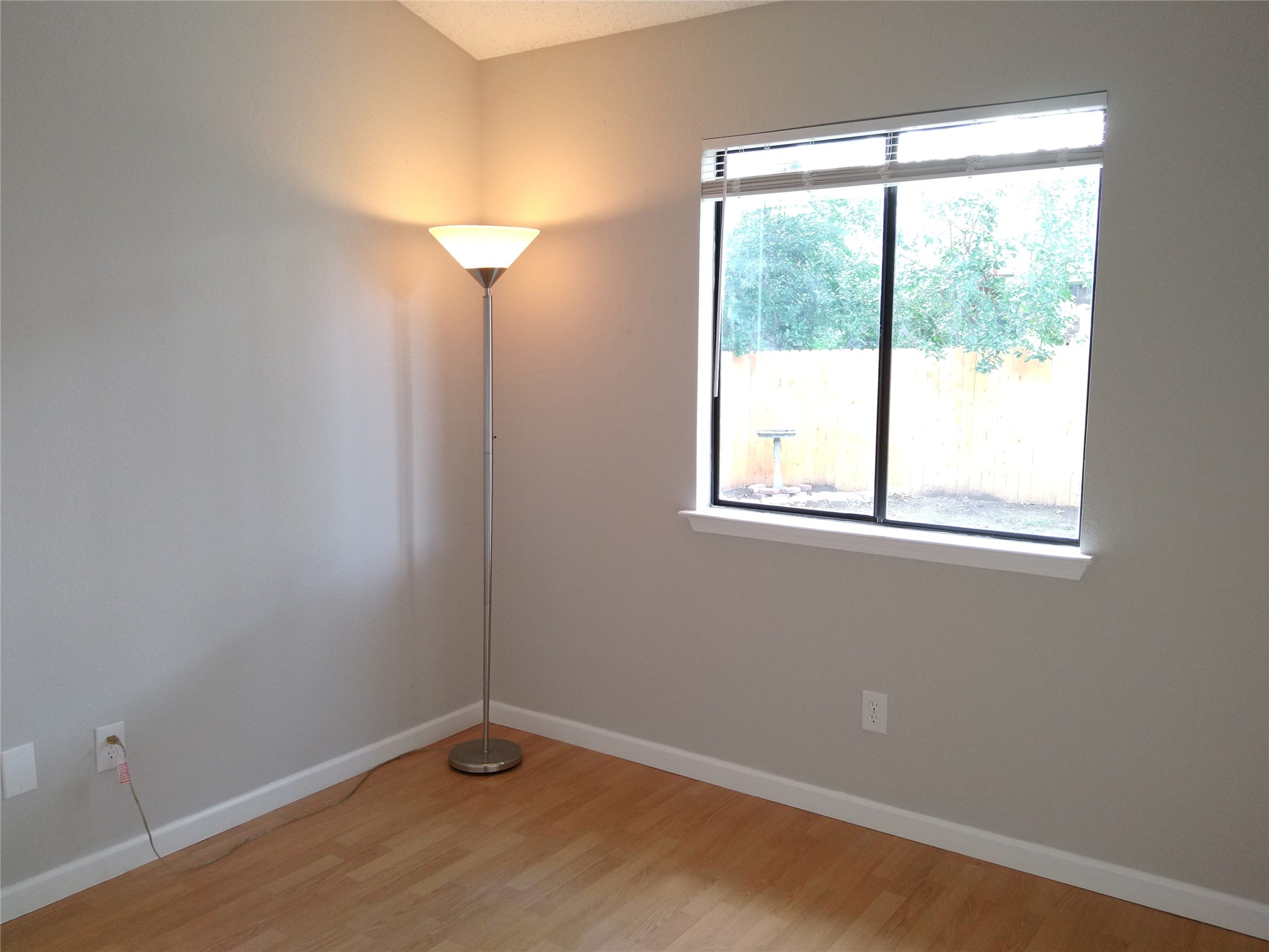 1813 Laurel Path Round Rock, TX 78664 - Photo 20 of 35 Hardwood floors and a well-lit corner await in this inviting room with a view.