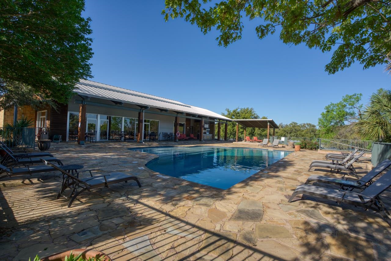 Lot 28 The Trails Parkway Horseshoe Bay, TX 78657 - Photo 15 of 30 a front view of a house with a yard