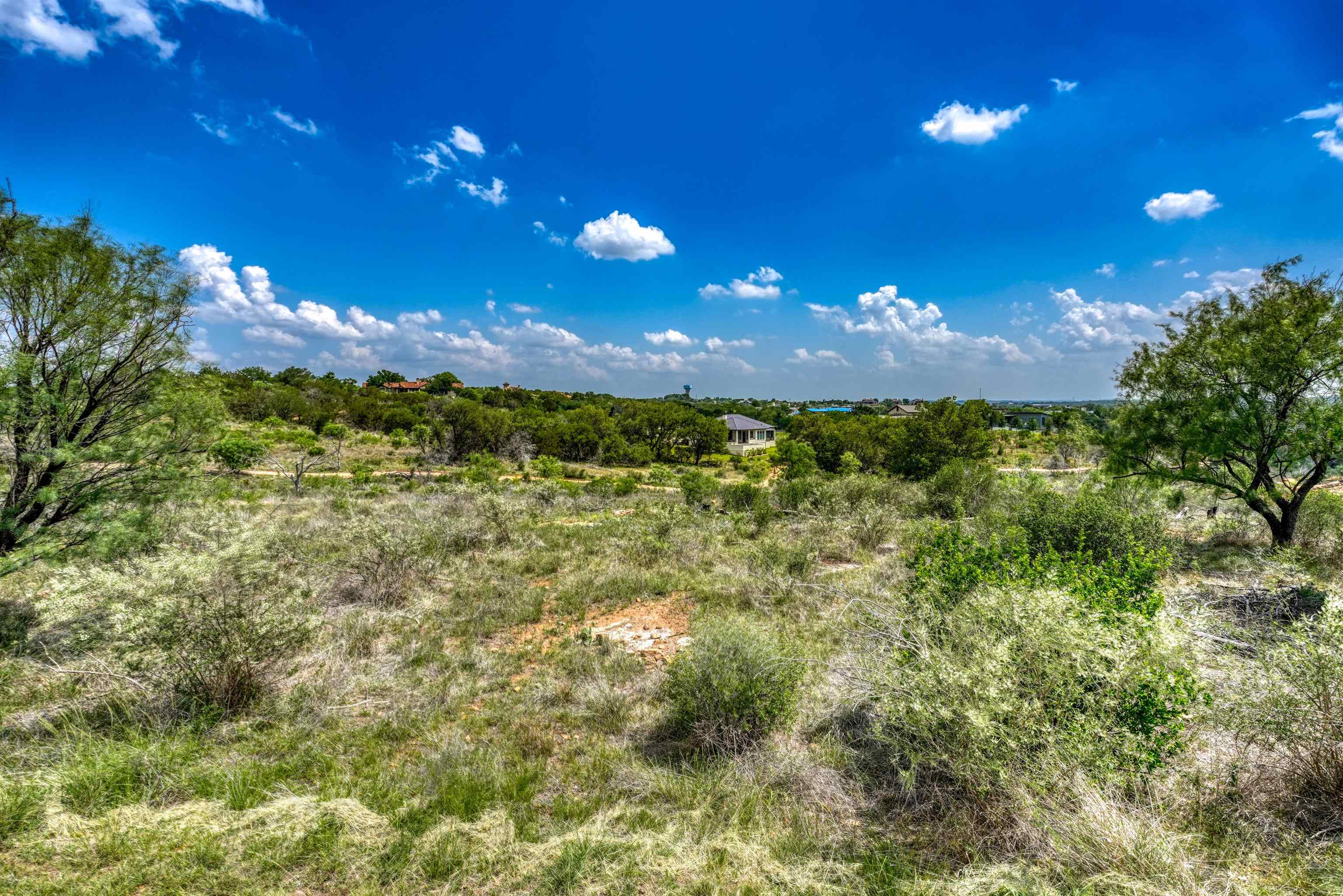 Lot 28 The Trails Parkway Horseshoe Bay, TX 78657 - Photo 6 of 30 a view of a yard with a house