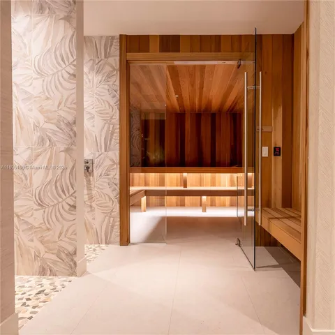 a view of front door with wooden floor