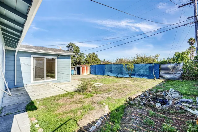 a view of a backyard of a house