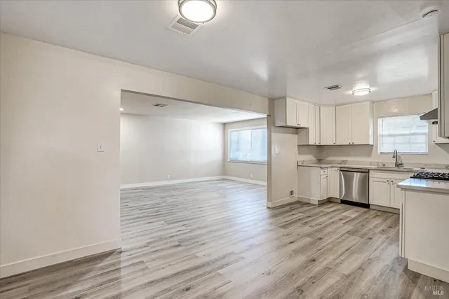 a view of kitchen with wooden floor