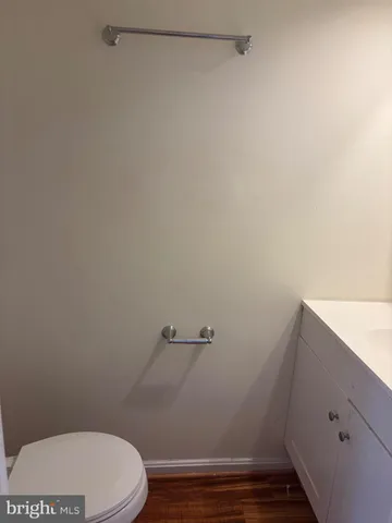 a view of a livingroom with wooden floor