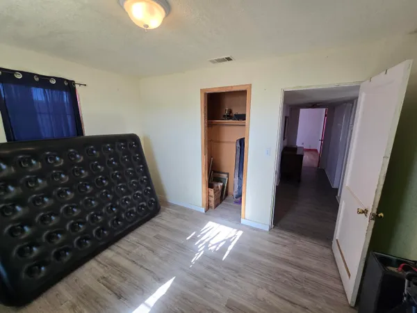 a room with furniture and a flat screen tv