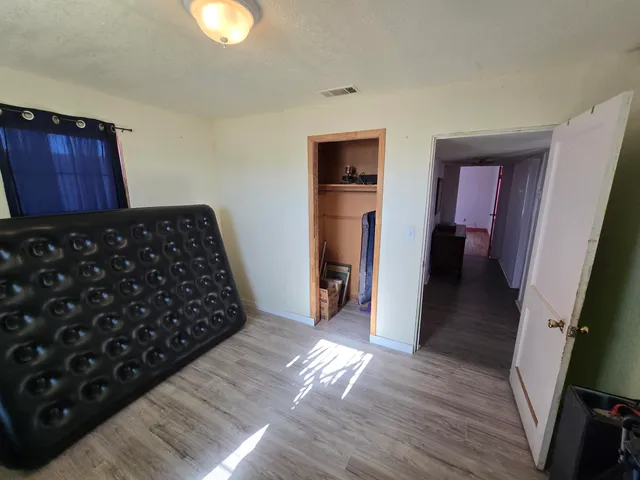 a room with furniture and a flat screen tv