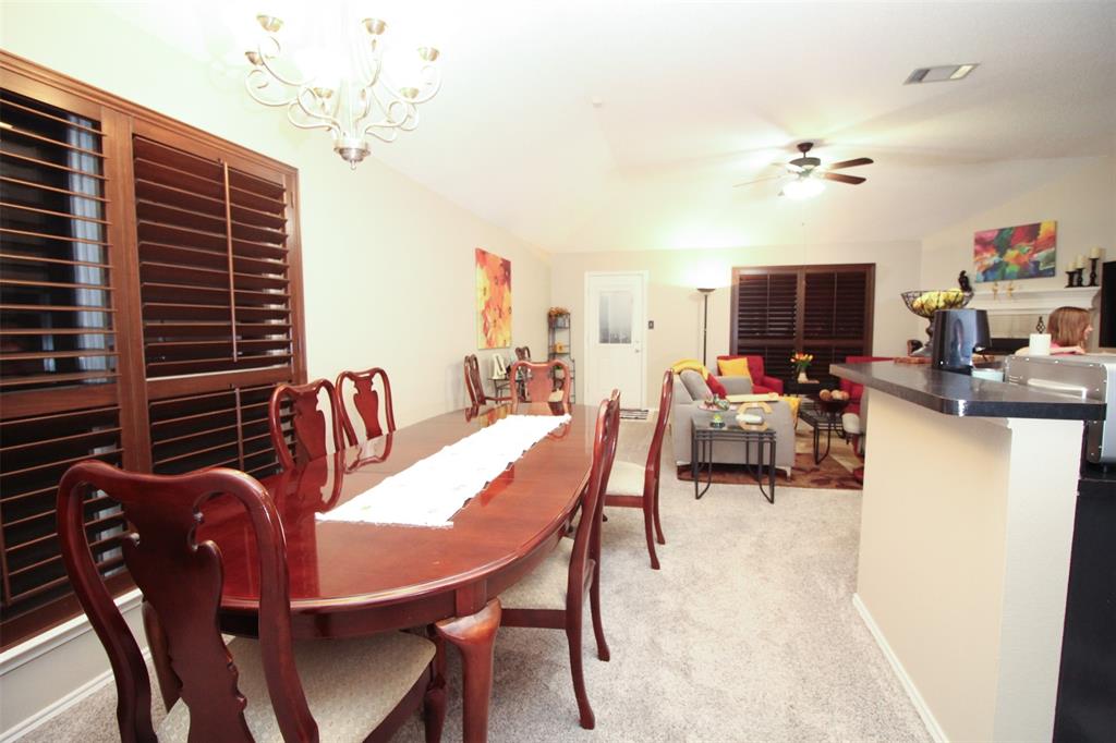 1606 Tyler Terrace Mansfield, TX 76063 - Photo 12 of 36 a view of a dining room with furniture