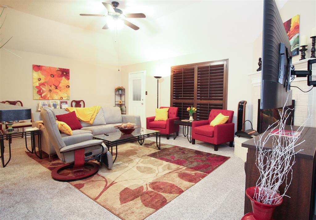 1606 Tyler Terrace Mansfield, TX 76063 - Photo 5 of 36 a living room with furniture rug and a window