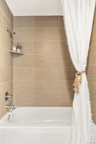 a bathroom with a bathtub