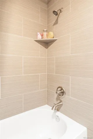 a bathroom with a sink and a shower