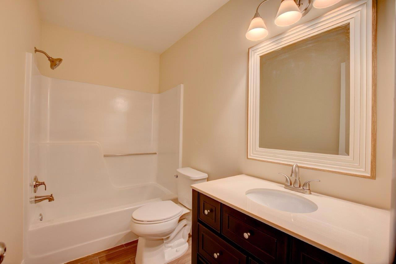 6350 Walk Circle Boca Raton, FL 33433 - Photo 21 of 29 a bathroom with a sink a toilet and shower
