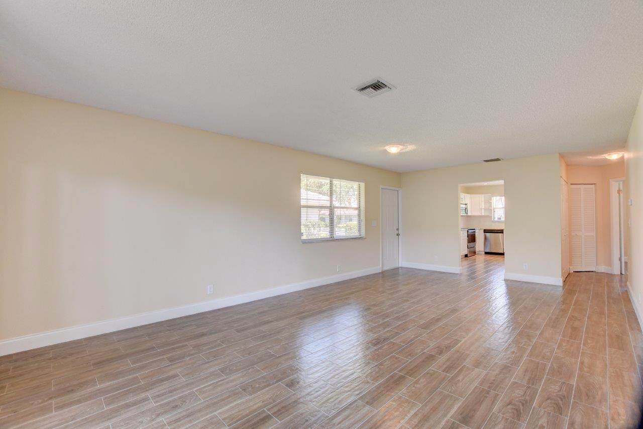 6350 Walk Circle Boca Raton, FL 33433 - Photo 5 of 29 a view of empty room with wooden floor