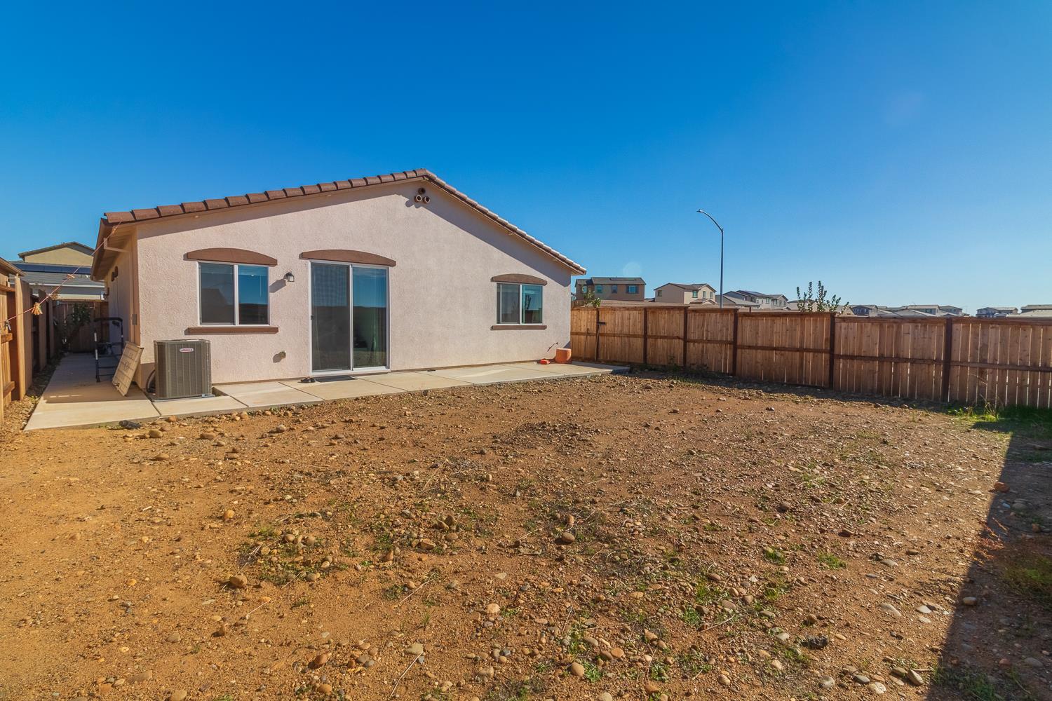 12868 Spotted Wren Circle Rancho Cordova, CA 95742 - Photo 25 of 46 a view of a backyard