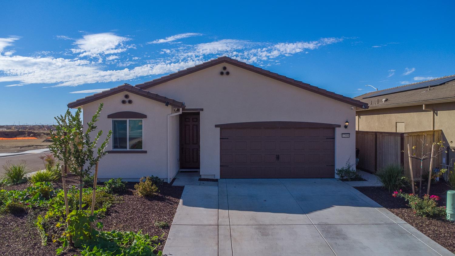 12868 Spotted Wren Circle Rancho Cordova, CA 95742 - Photo 28 of 46 a view of a house with a yard