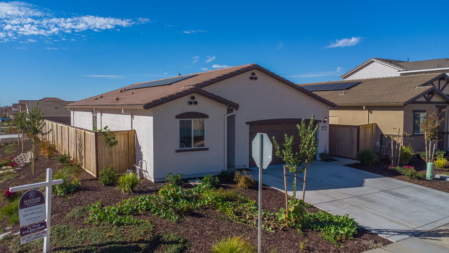 12868 Spotted Wren Circle Rancho Cordova, CA 95742 - Photo 30 of 46 a front view of a house with garden