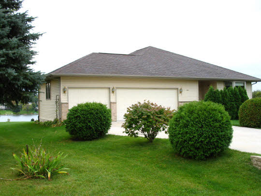 945 Lake Summerset Road Lake Summerset, IL 61019 - Photo 1 of 11 a view of a house with a garden