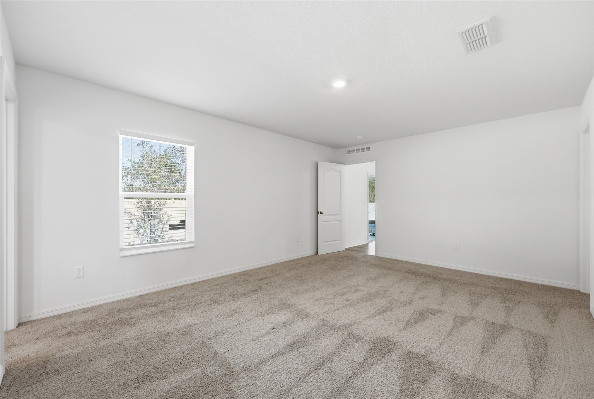 37474 Whisper Way Hilliard, FL 32046 - Photo 19 of 31 a view of an empty room with a window