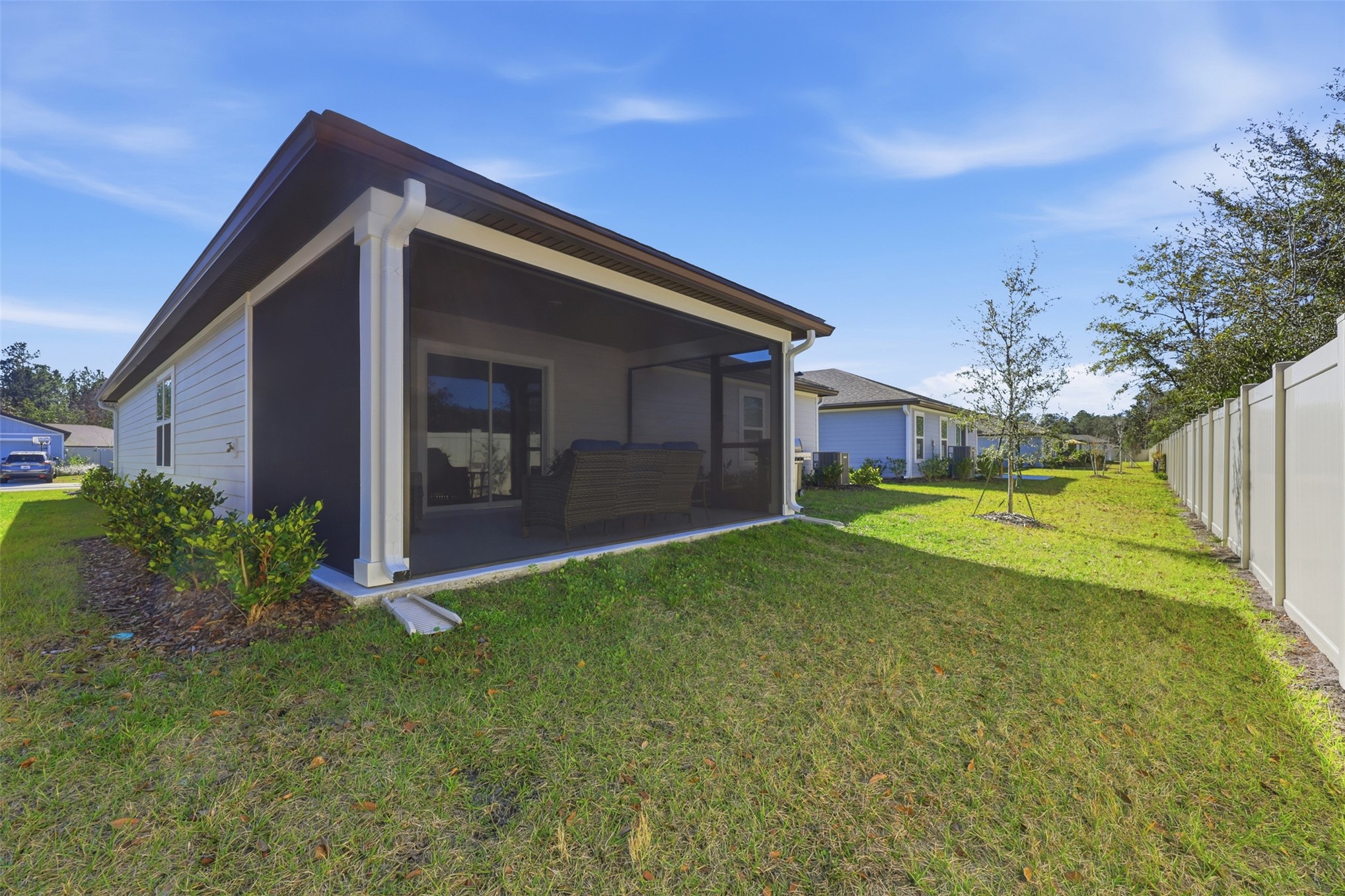 37474 Whisper Way Hilliard, FL 32046 - Photo 30 of 31 a view of a house with a big yard