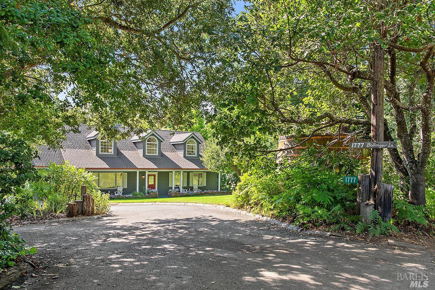 a view of an house with outdoor space and deck