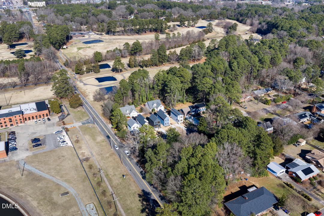 2530 West Wilson Street Durham, NC 27705 - Photo 44 of 49 an aerial view of residential houses with outdoor space