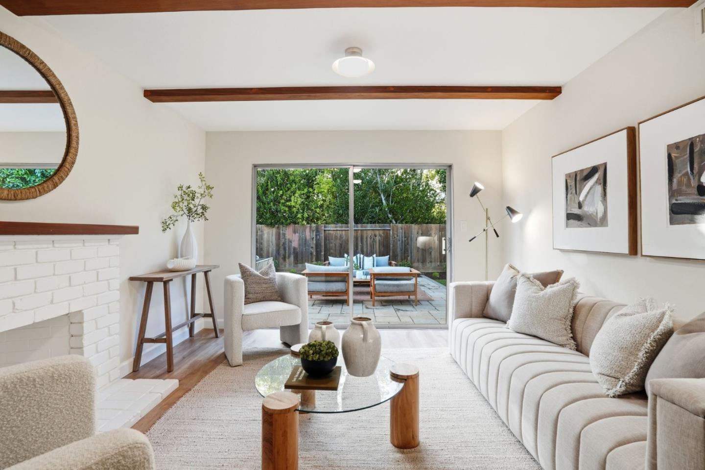 882 San Rafael Avenue Mountain View, CA 94043 - Photo 23 of 50 a living room with furniture and a fireplace