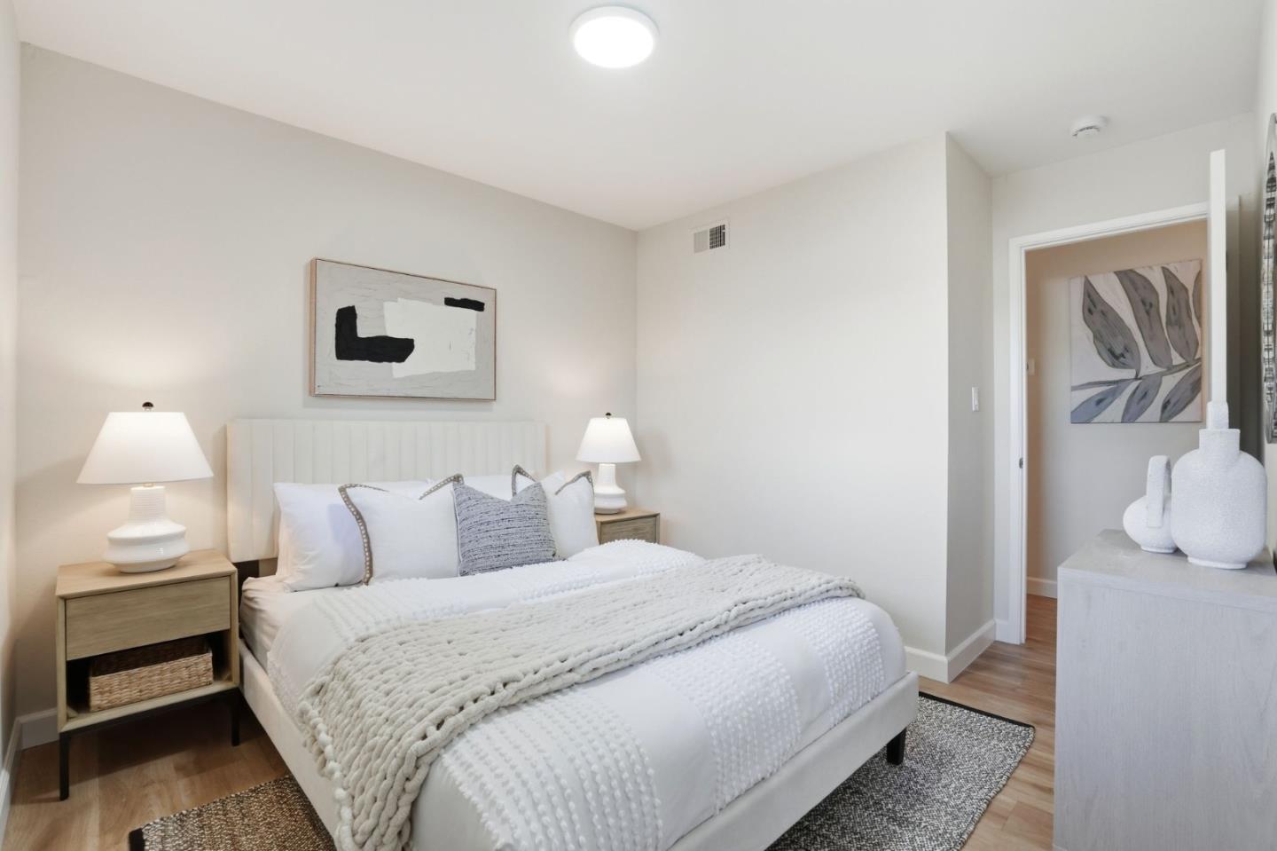 882 San Rafael Avenue Mountain View, CA 94043 - Photo 25 of 50 a bedroom with a bed and painting on the wall