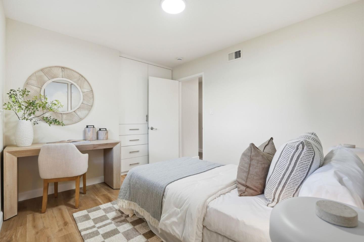 882 San Rafael Avenue Mountain View, CA 94043 - Photo 30 of 50 a bedroom with a bed and a table