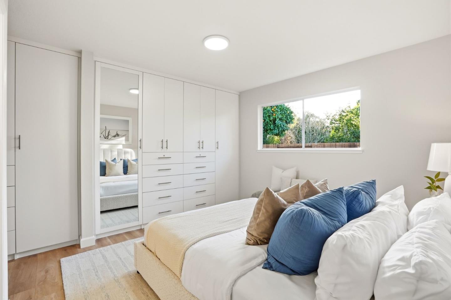 882 San Rafael Avenue Mountain View, CA 94043 - Photo 35 of 50 a bedroom with a bed and a window