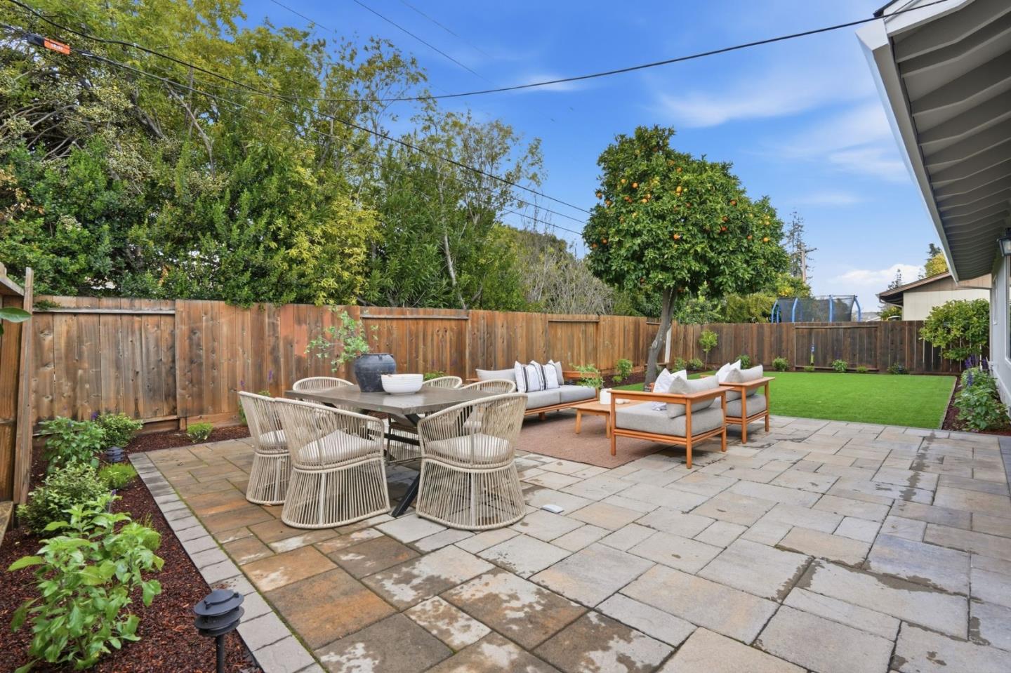 882 San Rafael Avenue Mountain View, CA 94043 - Photo 39 of 50 a backyard of a house with table and chairs