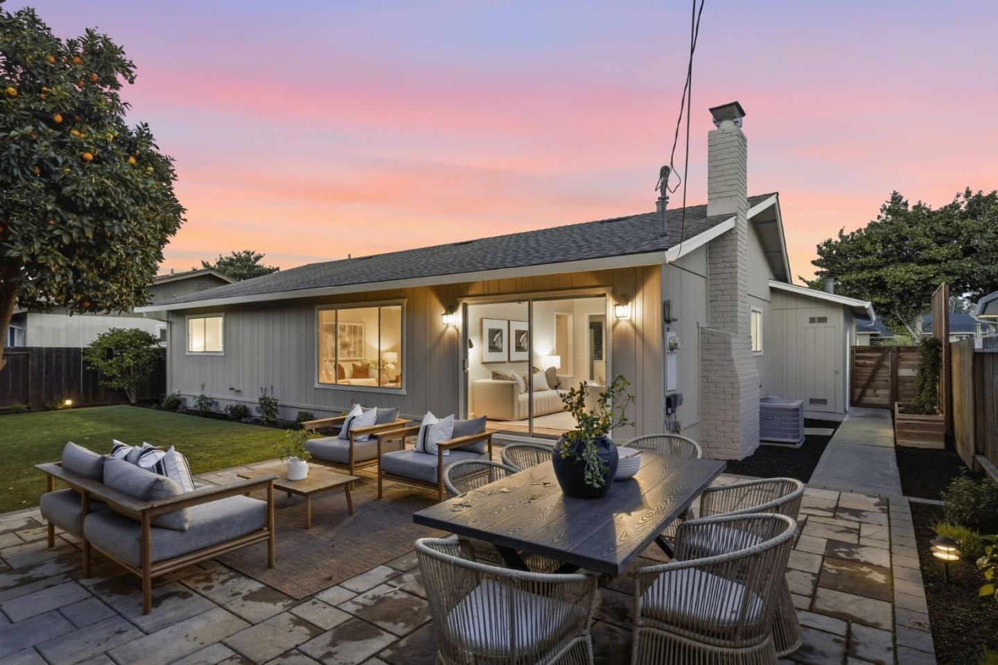 882 San Rafael Avenue Mountain View, CA 94043 - Photo 44 of 50 a view of a patio with couches table and chairs with wooden fence