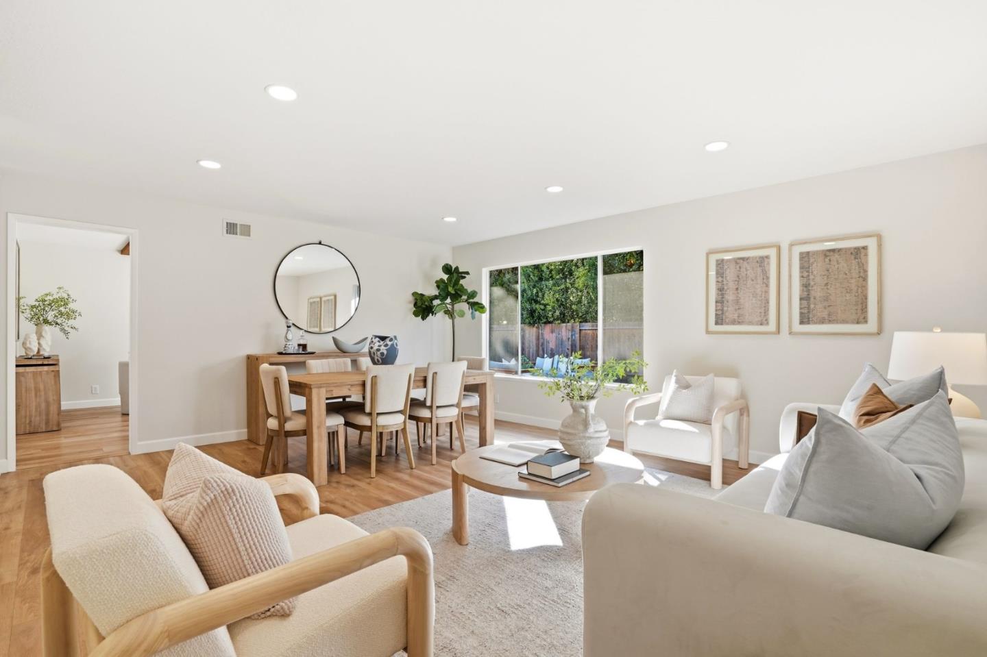 882 San Rafael Avenue Mountain View, CA 94043 - Photo 8 of 50 a living room with furniture and a large window