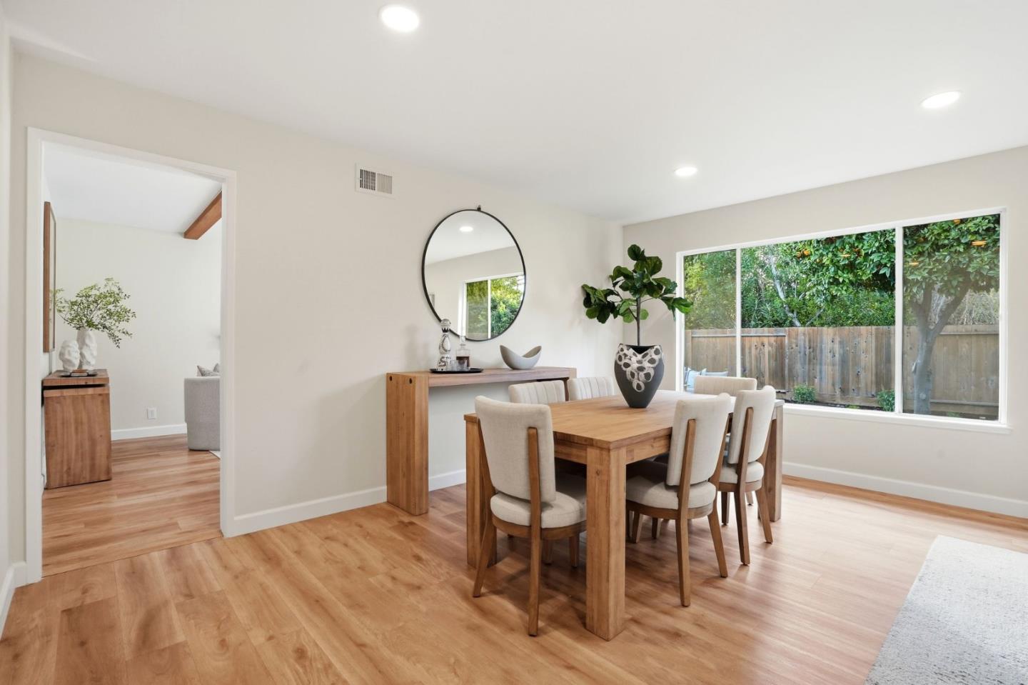 882 San Rafael Avenue Mountain View, CA 94043 - Photo 10 of 50 a view of a dining room with furniture window and wooden floor