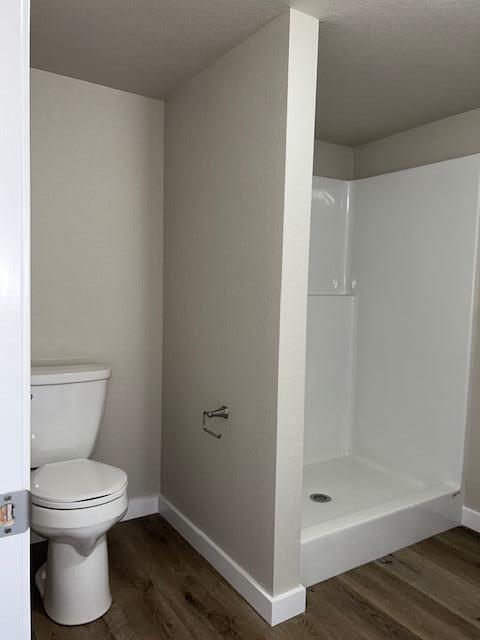 6135 Robin Road Crestview, FL 32539 - Photo 15 of 24 a bathroom with a toilet and shower